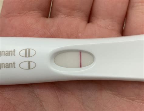 I did another pregnancy test this morning and the line is not as faint anymore. . 11 dpo faint positive 12dpo negative